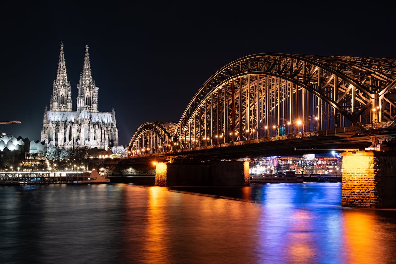 Cologne Cathedral and Hohenzollern Bridge by the River Rhine