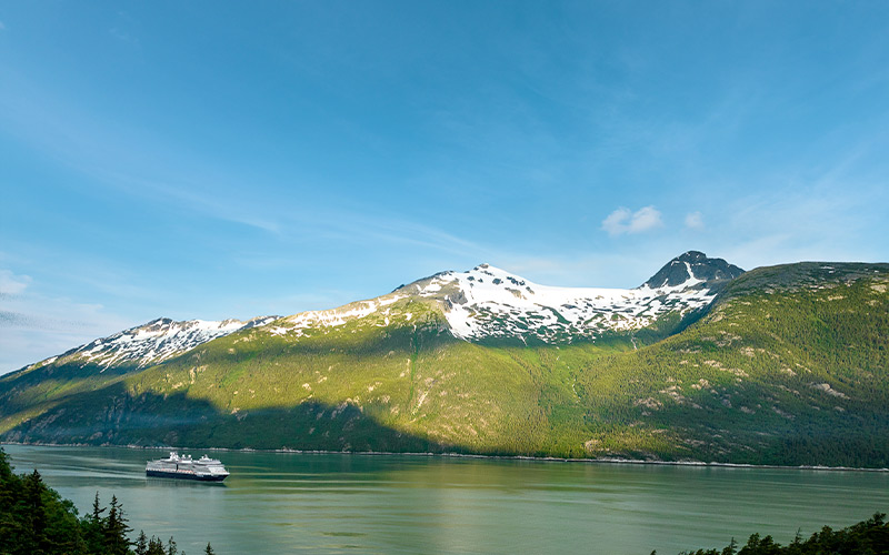 Holland America Cruise ship with mountains